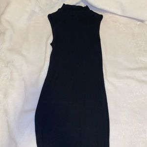 Black turtle neck no sleeve dress